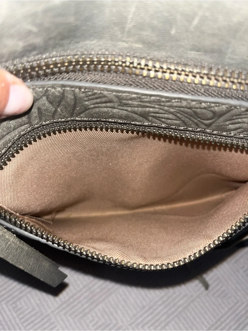 The Sak Metallic Gray Embossed Leather Backpack